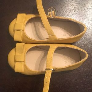 Beautiful golden yellow toddler shoes